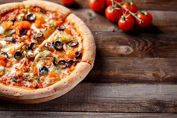 Image showing Vegeterian pizza with mushrooms and olives