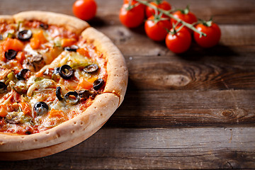 Image showing Vegeterian pizza with mushrooms and olives