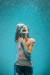 Image showing The portrait of young beautiful woman in the rain