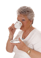 Image showing Senior woman drinking coffee.