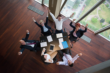 Image showing happy business people group on meeting at modern office