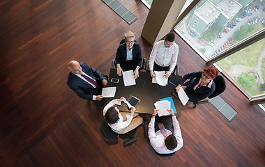 Image showing happy business people group on meeting at modern office
