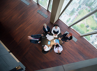 Image showing happy business people group on meeting at modern office