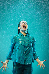 Image showing The portrait of young beautiful woman in the rain