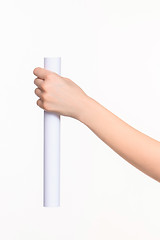 Image showing The cylinder female hands on white background