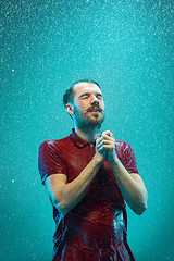 Image showing The portrait of young man in the rain