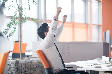 Image showing young business man  working on desktop computer