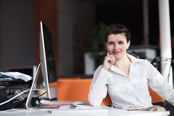 Image showing happy young business woman relaxing and geting insiration