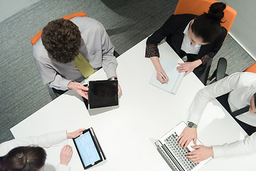 Image showing aerial view of business people group brainstorming on meeting