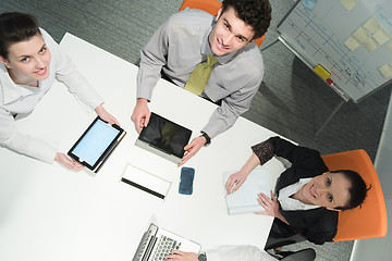 Image showing aerial view of business people group brainstorming on meeting