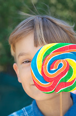 Image showing boy with lollipop