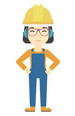 Image showing Woman wearing hard hat and headphones 