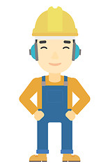 Image showing Man wearing hard hat and headphones 