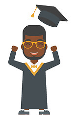 Image showing Graduate throwing up his hat.