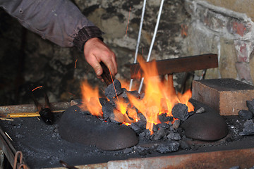 Image showing old smithery and fire