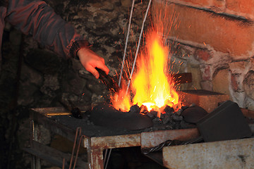 Image showing old smithery and fire