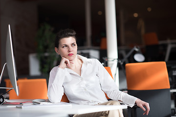 Image showing happy young business woman relaxing and geting insiration