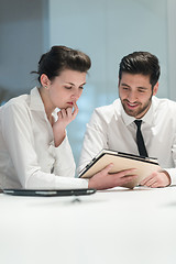 Image showing young business couple working together on project