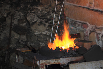 Image showing old smithery and fire