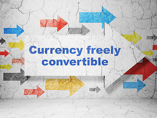 Image showing Banking concept: arrow with Currency freely Convertible on grunge wall background
