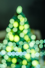 Image showing Decorated Christmas tree. Abstract blurred lights background