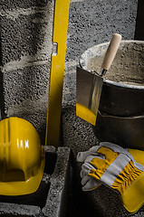 Image showing Tools for bricklayer bucket with a solution and a trowel