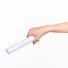 Image showing The cylinder female hands on white background