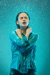 Image showing The portrait of young beautiful woman in the rain