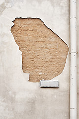 Image showing cracked  wall with street sign