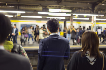 Image showing Passengers traveling by Tokyo metro.