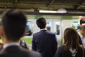 Image showing Passengers traveling by Tokyo metro.