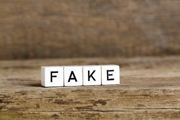 Image showing The word fake written in cubes