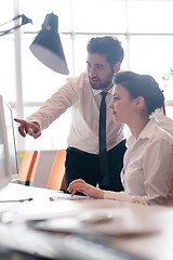 Image showing business couple working together on project