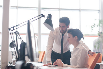 Image showing business couple working together on project