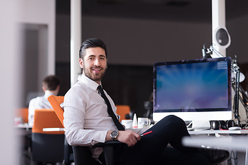 Image showing young business man  working on desktop computer