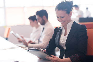 Image showing business woman on meeting  using tablet