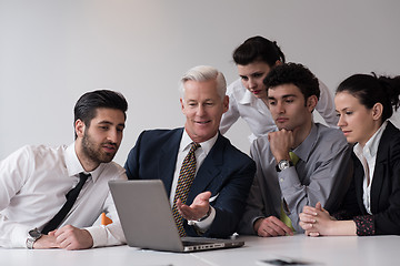 Image showing business people group on meeting at modern startup office