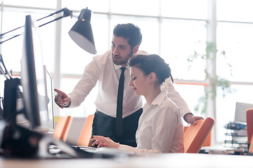 Image showing business couple working together on project