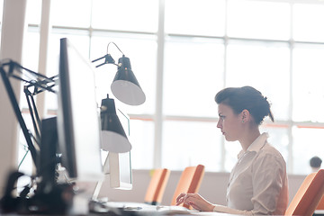 Image showing business woman working on computer at office