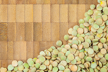 Image showing lentil on a cork surface