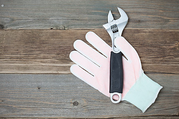 Image showing white glove and adjustable spanner