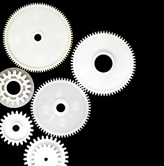 Image showing gear wheels on black