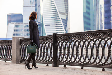 Image showing woman in a dark coat