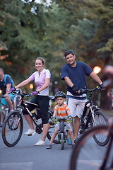 Image showing young family with bicycles