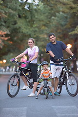 Image showing young family with bicycles