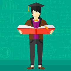 Image showing Man in graduation cap holding book.