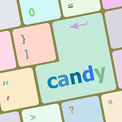 Image showing candy key on computer keyboard button vector illustration