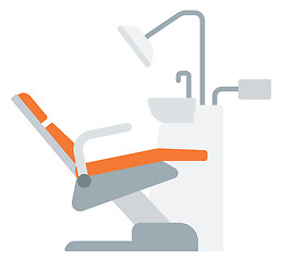 Image showing Dental chair with instruments and tools.