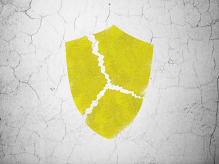 Image showing Safety concept: Broken Shield on wall background