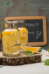 Image showing Lemon and lime slices in jars